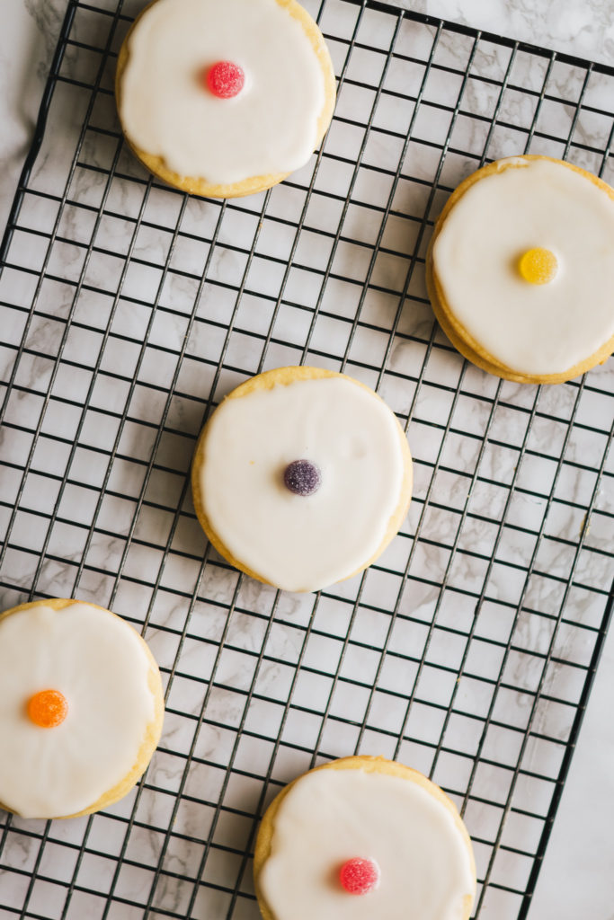 Empire biscuits on cooling rack topped with different colour jelly tots