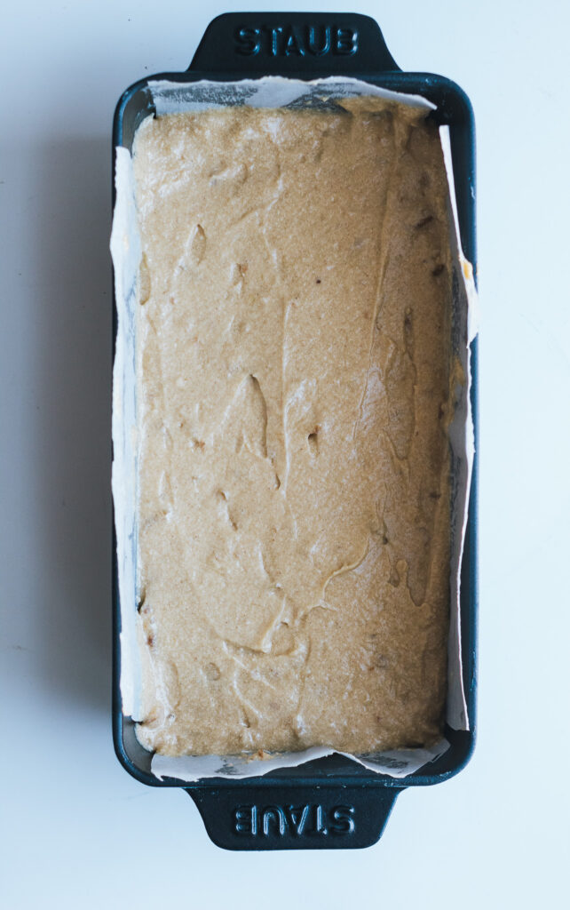 Coffee and Walnut Loaf batter in loaf tin ready to be baked