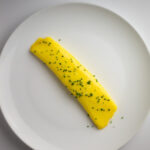 French Omelette and chives on a plate