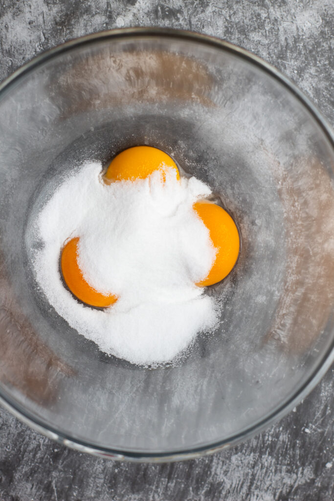 egg yolks and sugar in a bowl