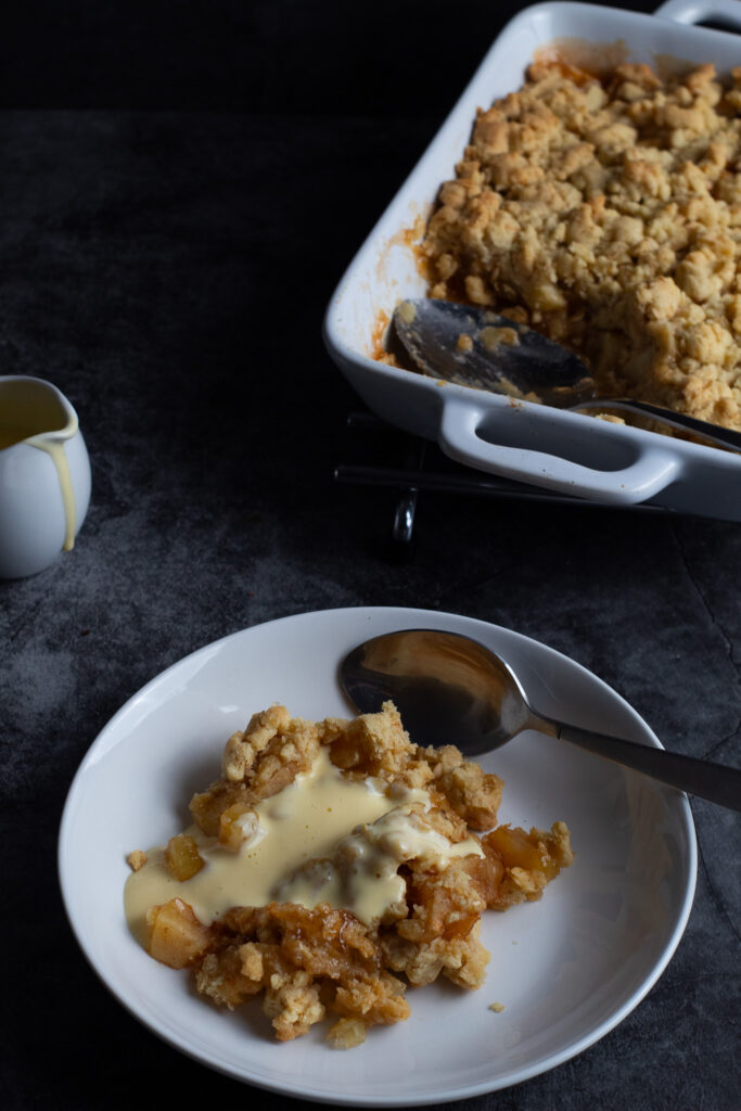 apple crumble and custard in a bowl