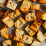 Croutons on greaseproof paper