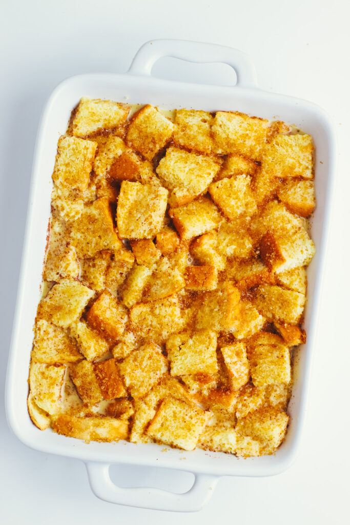 Custard soaked brioche bread in a baking dish