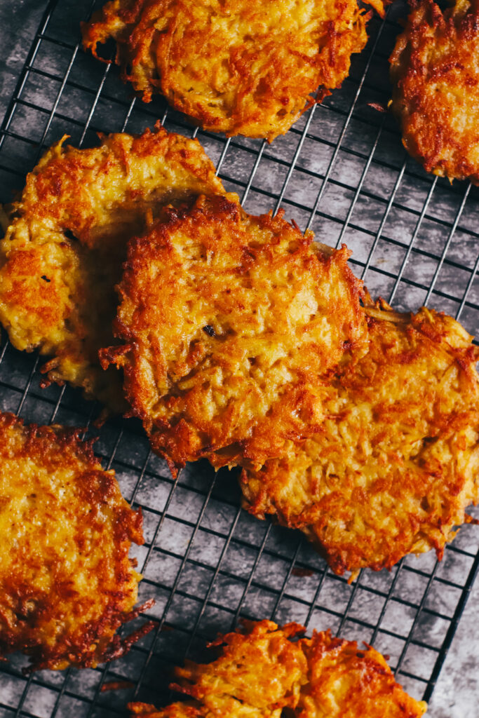Potato fritters on a cooling rack