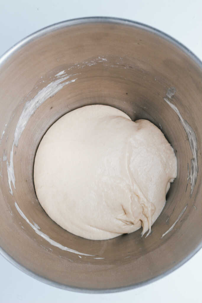 Ciabatta dinner rolls dough in mixer bowl