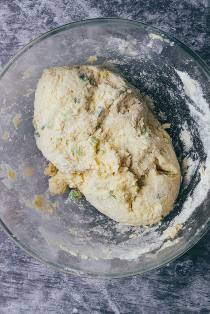 cheese and onion scone dough in a bowl
