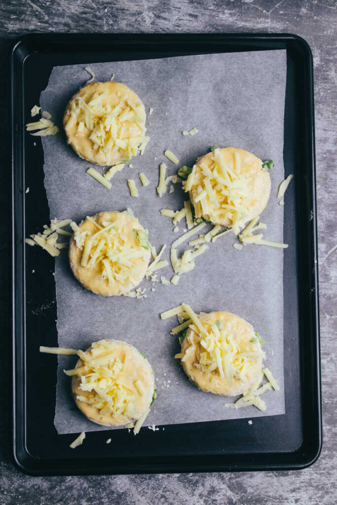 Cheese and onion scones on a baking tray