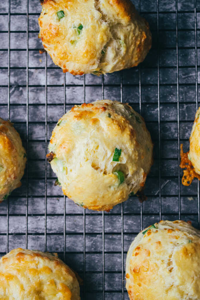 cheese and onion scones on a cooling rack