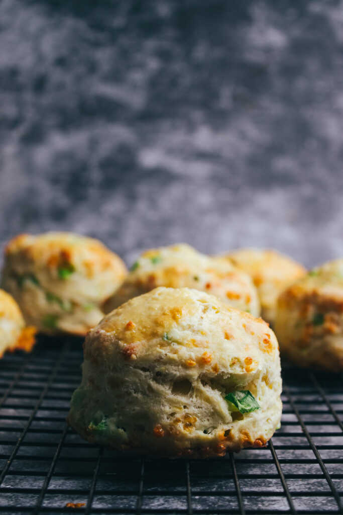 cheese and onion scones on a cooling rack