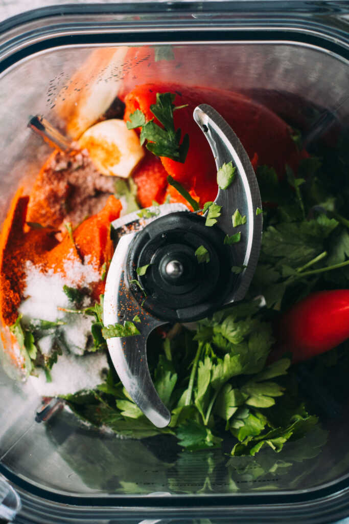 Chimichurri roja ingredients in a food processor