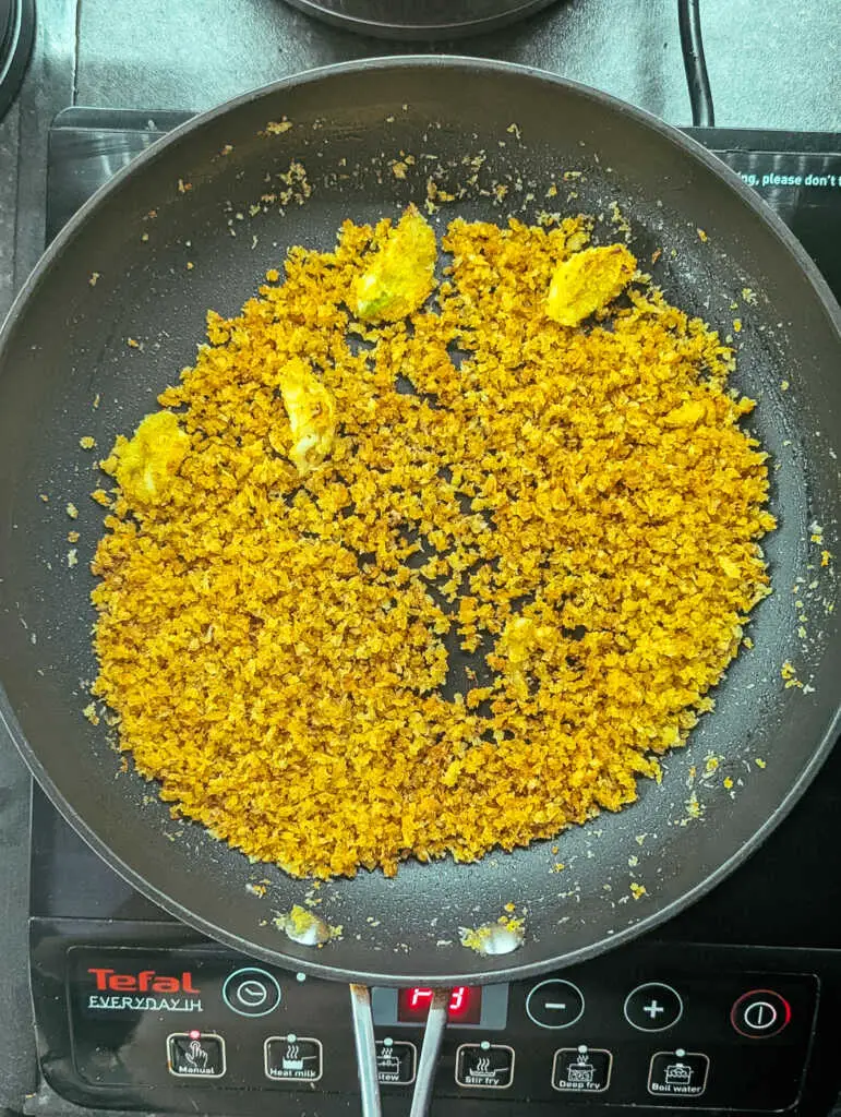 golden breadcrumbs in a pan with garlic