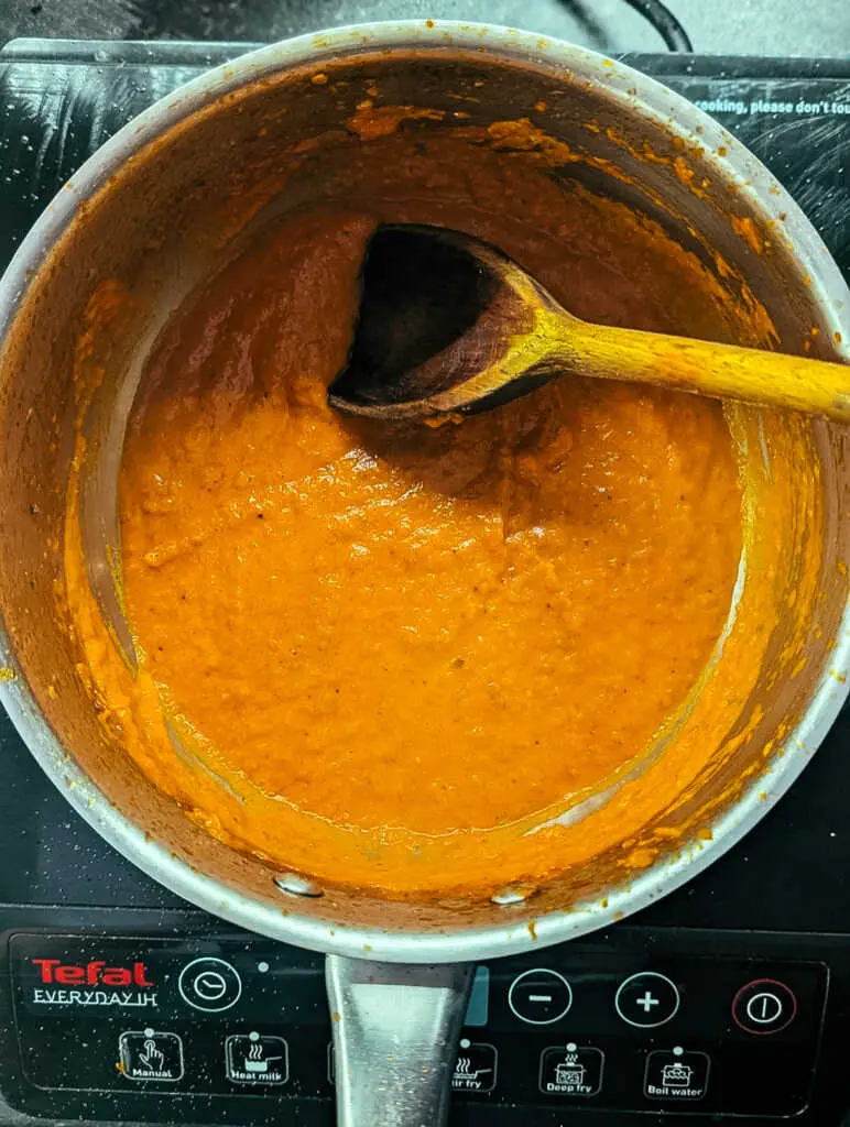 blended tomato butter sauce in a saucepan