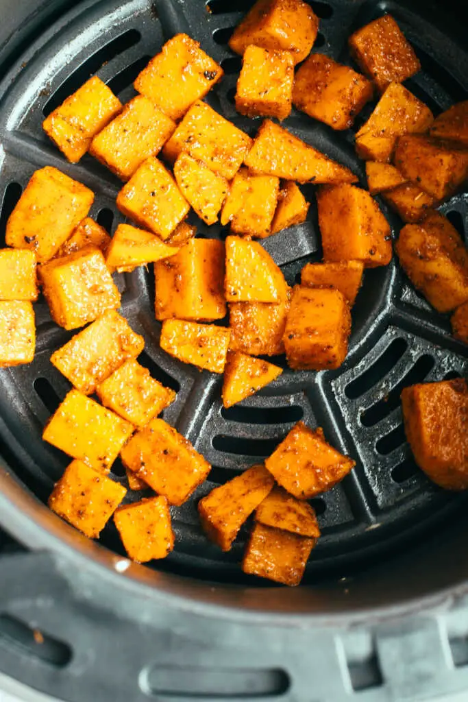 raw sweet potato cubes in the air fryer